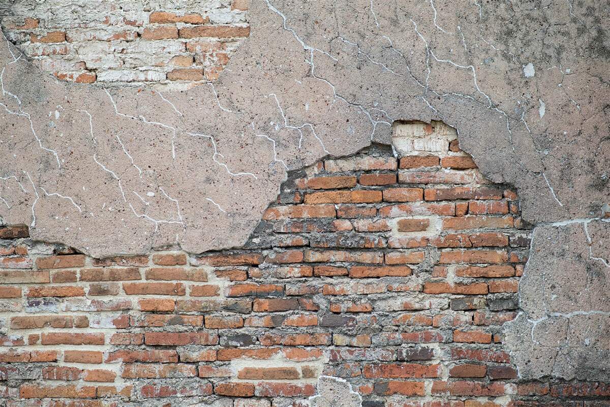 Fototapeta rozpadający się ceglany mur