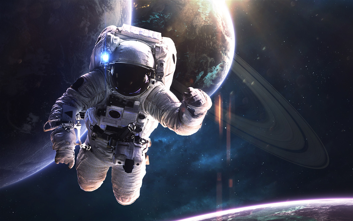 Fototapeta astronauta na tle Jowisza